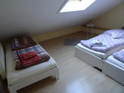 Ein Bett oder Betten in einem Zimmer der Unterkunft Fewo Lena