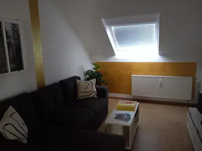 Ein Sitzbereich in der Unterkunft Ferienwohnung im roten Haus, die Therme ist fußläufig in 350m zu erreichen