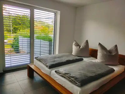 Ein Bett oder Betten in einem Zimmer der Unterkunft Moselufer Apartments