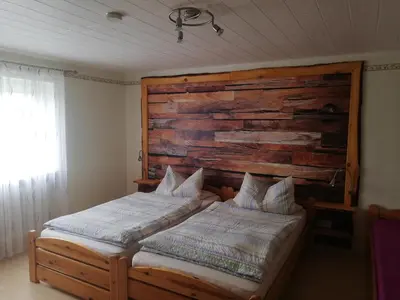Ein Bett oder Betten in einem Zimmer der Unterkunft Ferienwohnung Altmaier - Ferien auf dem Lande
