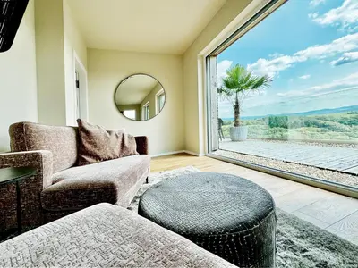 Ein Sitzbereich in der Unterkunft LuxApart Eifel mit privater Sauna