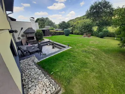 Ein Garten an der Unterkunft Ferienhaus Schwalbennest