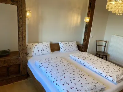 Ein Bett oder Betten in einem Zimmer der Unterkunft Schatztruhe - Ferienwohnung