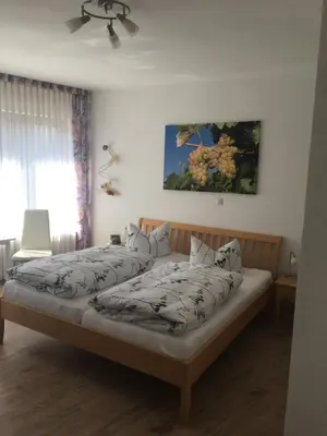 Ein Bett oder Betten in einem Zimmer der Unterkunft Pension 