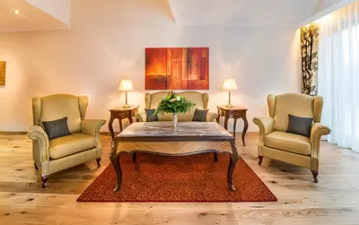 Ein Sitzbereich in der Unterkunft Residence Bellevue