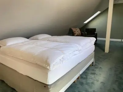 Ein Bett oder Betten in einem Zimmer der Unterkunft Das Alte Bürgermeisteramt