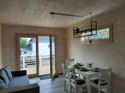 Ein Sitzbereich in der Unterkunft Hunsrück Chalet