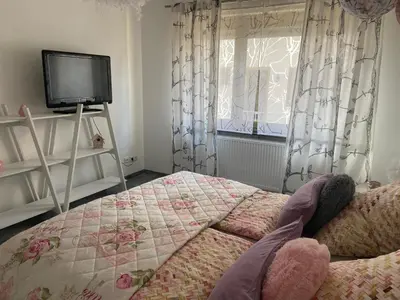 Ein Bett oder Betten in einem Zimmer der Unterkunft Haus Elsternest