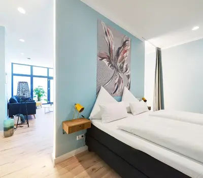 Ein Bett oder Betten in einem Zimmer der Unterkunft Design Studio I 3 Personen I Innenstadt I Küche I WIFI