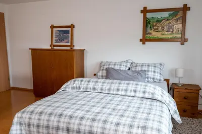 Ein Bett oder Betten in einem Zimmer der Unterkunft Yn e Homeie