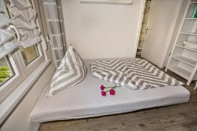 Ein Bett oder Betten in einem Zimmer der Unterkunft Ferienhaus Therese