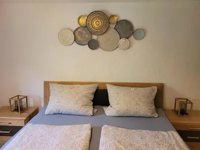 Ein Bett oder Betten in einem Zimmer der Unterkunft Ferienhaus im Moseltal