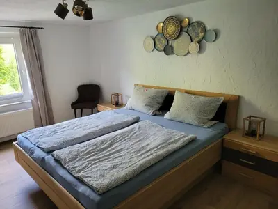 Ein Bett oder Betten in einem Zimmer der Unterkunft Ferienhaus im Moseltal