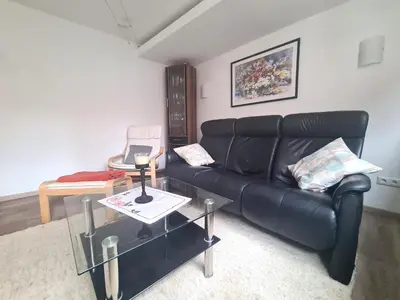 Ein Sitzbereich in der Unterkunft Ferienwohnung Zilliken