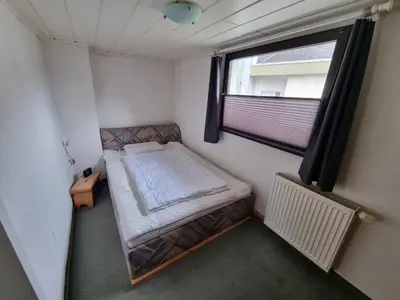 Ein Bett oder Betten in einem Zimmer der Unterkunft Ferienhaus Welling