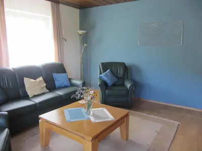 Ein Sitzbereich in der Unterkunft Ferienwohnung Roter Wingert