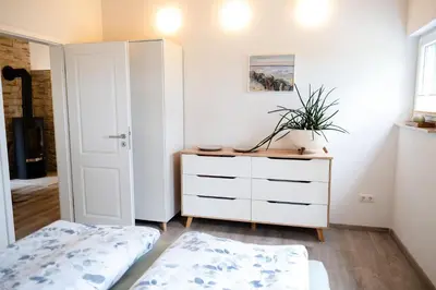 Ein Bett oder Betten in einem Zimmer der Unterkunft Ferienhaus Leonidas