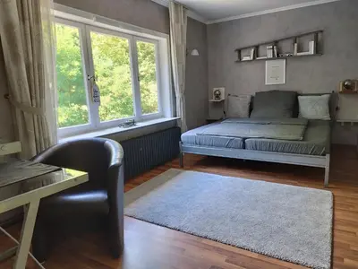 Ein Sitzbereich in der Unterkunft Literaturhaus Schmökermühle