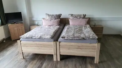 Ein Bett oder Betten in einem Zimmer der Unterkunft Ferienwohnung am Ring