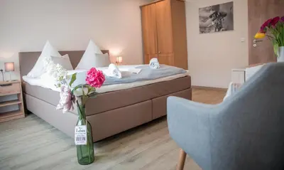 Ein Bett oder Betten in einem Zimmer der Unterkunft Weingut Erich Serwazi