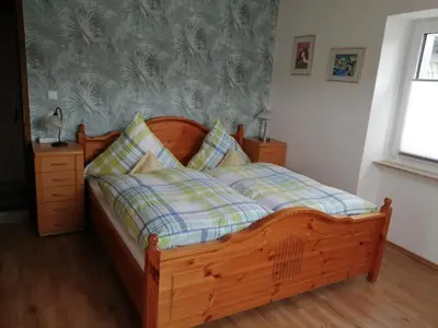 Ein Bett oder Betten in einem Zimmer der Unterkunft Fewo1926