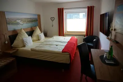 Ein Bett oder Betten in einem Zimmer der Unterkunft Hotel Jan van Werth