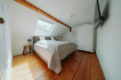 Ein Bett oder Betten in einem Zimmer der Unterkunft Residenz Moselliebe