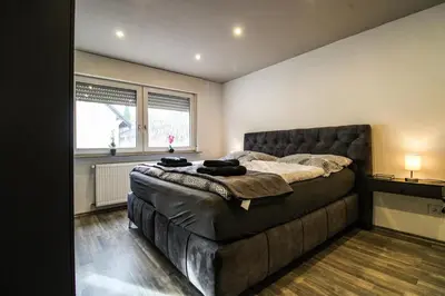Ein Bett oder Betten in einem Zimmer der Unterkunft Sweet Six, Sauna, Balkon, 6 Personen, Boxspringbetten, hochwertiges Bad