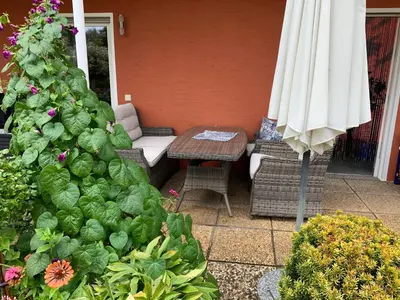 Ein Garten an der Unterkunft Grüne Oase