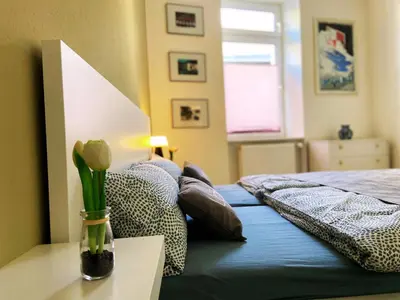 Ein Bett oder Betten in einem Zimmer der Unterkunft Kamoro
