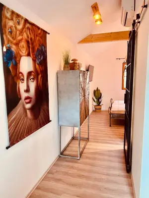 Ein Bett oder Betten in einem Zimmer der Unterkunft Echternacher Hof - Moselloft