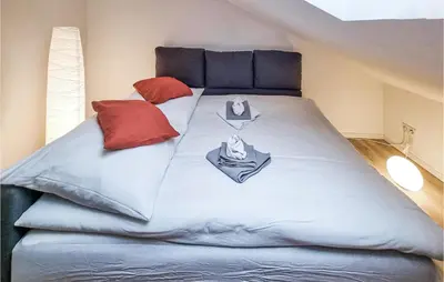 Ein Bett oder Betten in einem Zimmer der Unterkunft Gorgeous Apartment In Trier With Wifi