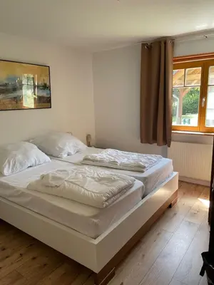 Ein Bett oder Betten in einem Zimmer der Unterkunft Das gelbe Landhaus