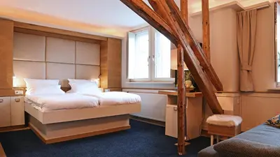 Ein Bett oder Betten in einem Zimmer der Unterkunft Rhein Hotel Bacharach und Stübers Restaurant