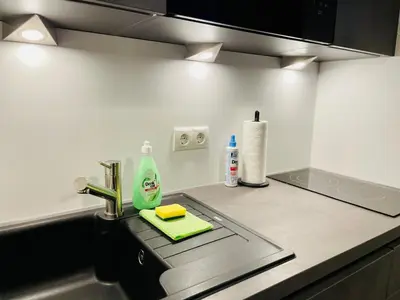 Küche/Küchenzeile in der Unterkunft Klassen Stay - Exklusive Apartments am HBF - Küche, Netflix