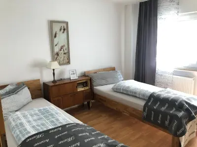 Ein Bett oder Betten in einem Zimmer der Unterkunft Monteur- und Gästehaus am Brückchen mit All Inklusive Nutzung