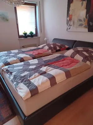 Ein Bett oder Betten in einem Zimmer der Unterkunft Ferienwohnung Fischer