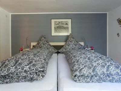 Ein Bett oder Betten in einem Zimmer der Unterkunft Moselle Vineyard Escape