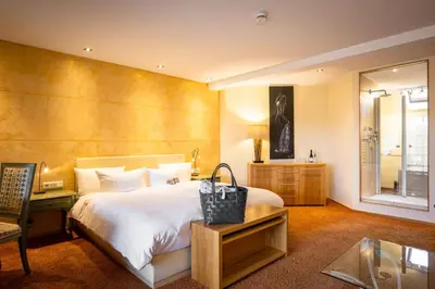 Ein Bett oder Betten in einem Zimmer der Unterkunft Das Landhaus - by BollAnts