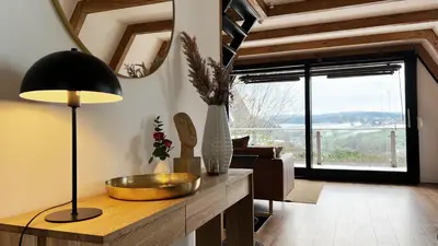 Ein Sitzbereich in der Unterkunft Design Chalet Vulkaneifel