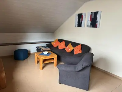 Ein Sitzbereich in der Unterkunft Ferienwohnung 
