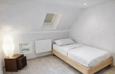 Ein Bett oder Betten in einem Zimmer der Unterkunft Ferienwohnungen am Holzmarkt, am Rande der Altstadt