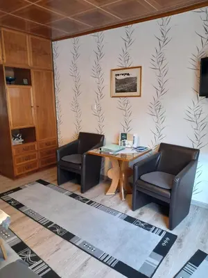 Ein Sitzbereich in der Unterkunft Ferienhaus Heimes