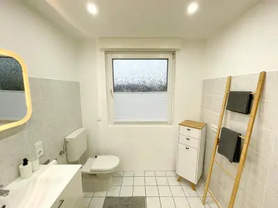 Ein Badezimmer in der Unterkunft Ferienwohnung Schönes Maifeld
