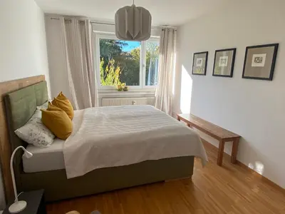 Ein Bett oder Betten in einem Zimmer der Unterkunft Schöne Wohnung 90qm mit Sonnenterrasse und Aussicht