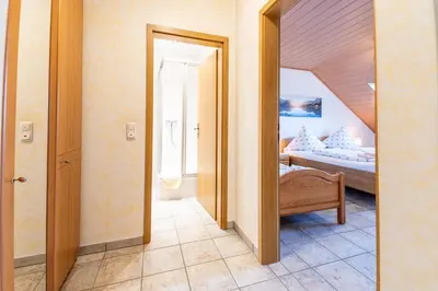 Ein Bett oder Betten in einem Zimmer der Unterkunft Ferienwohnung Linda