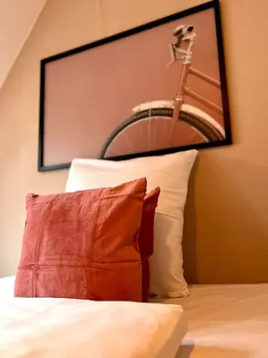 Ein Bett oder Betten in einem Zimmer der Unterkunft Stadtoase Design Wohnung in der Altstadt von Koblenz