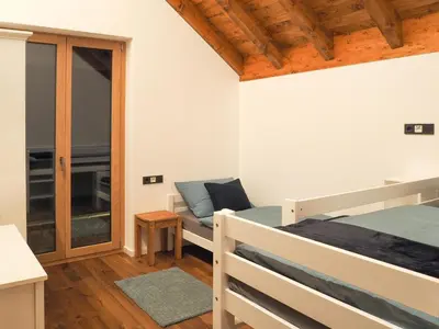 Ein Bett oder Betten in einem Zimmer der Unterkunft Ferienwohnungen Kohnshof