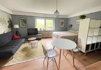 Ein Bett oder Betten in einem Zimmer der Unterkunft Mitten in Nastätten und doch im Grünen: schönes und modernes Apartment