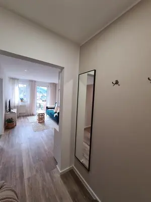 Ein Bett oder Betten in einem Zimmer der Unterkunft Ferienwohnung Rosenberg
